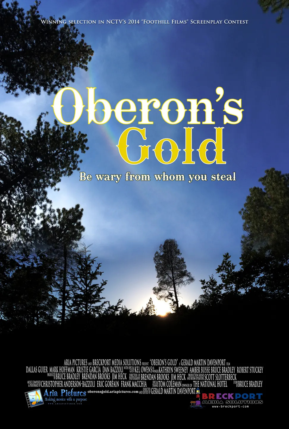 Oberon's Gold movie poster. Blue sky with rainbow and trees with cast and crew credits.